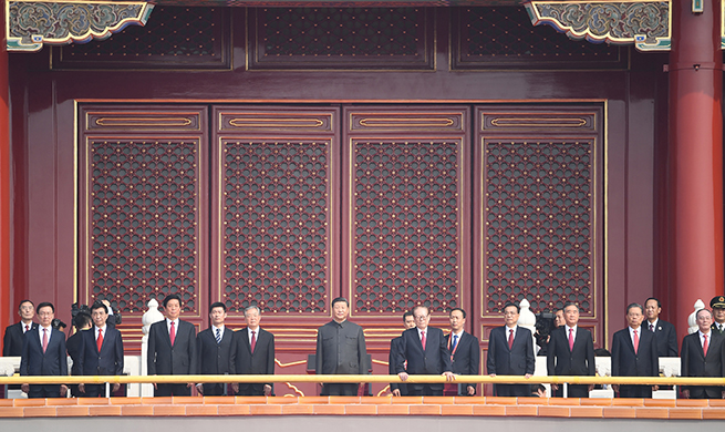 Xi ascends Tian'anmen Rostrum to attend National Day celebrations