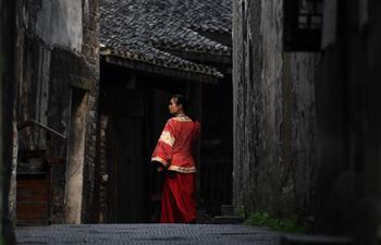 Photographers gather in C China's Hongjiang to attend competition