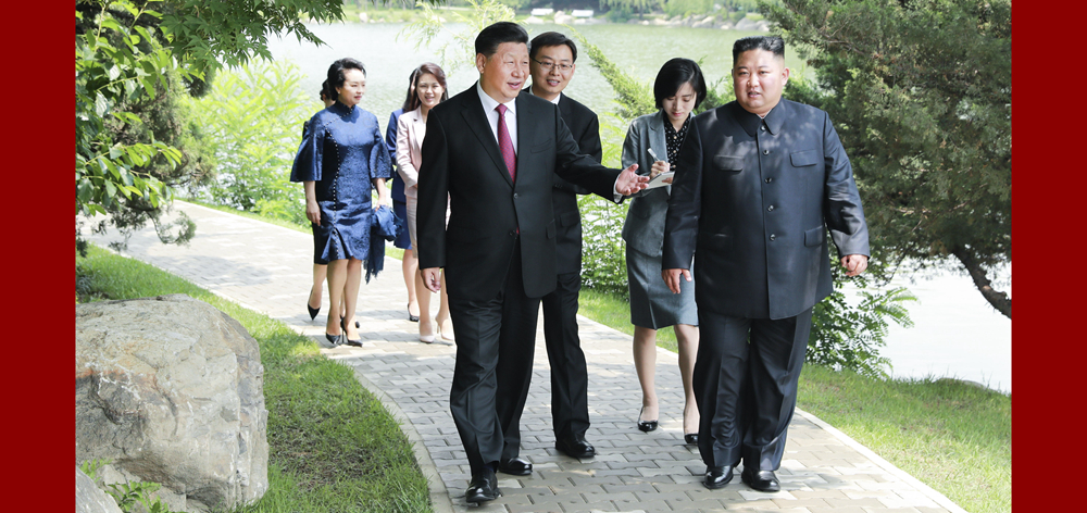 习近平会见朝鲜劳动党委员长、国务委员会委员长金正恩